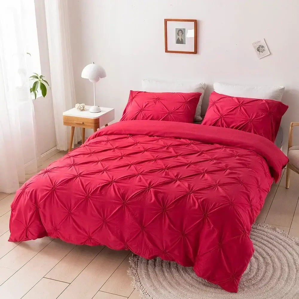 Vibrant red quilted duvet cover set with starburst pattern and diamond design for elegant bedroom decor