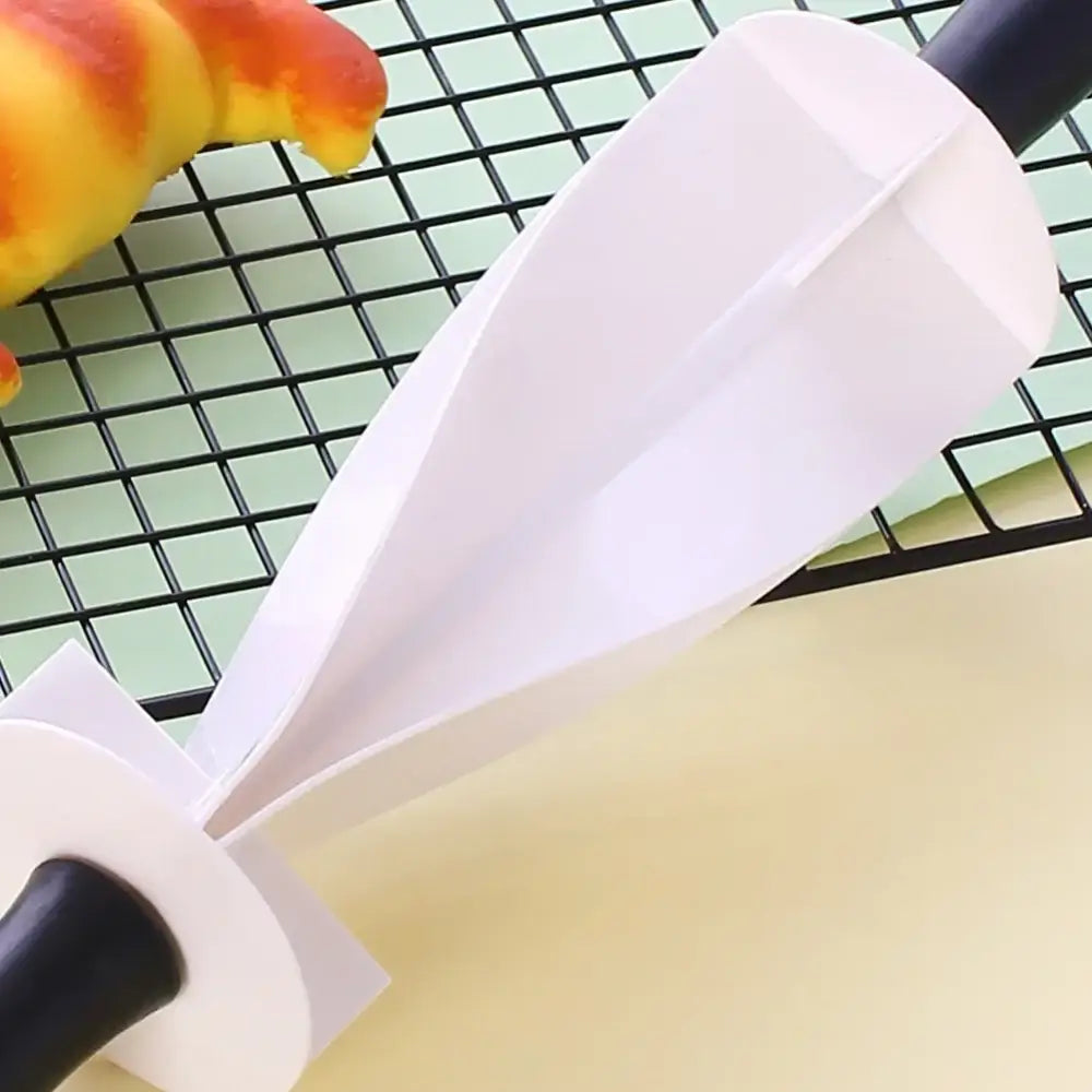White plastic piping bag with black handles for decorbites croissant bread wheel cutter kitchen pastry tool