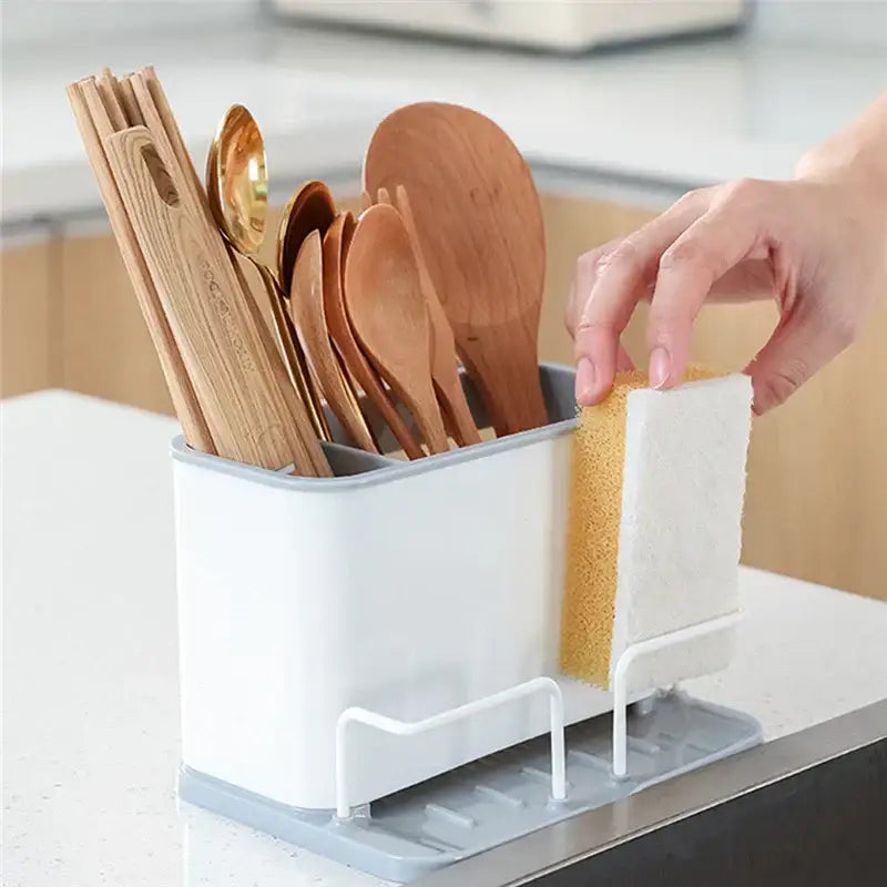 White and gray kitchen utensil organizer with sponge holder featuring a double grid cutlery organizer design
