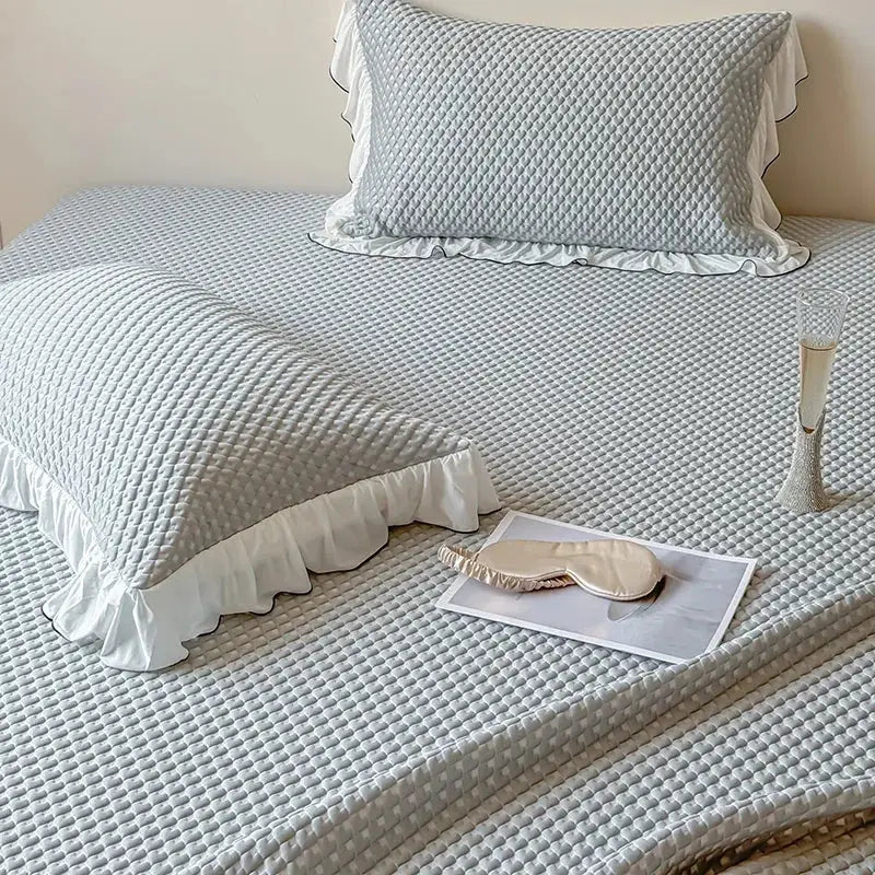 Light gray quilted bedding set with white ruffled edges for decorbites cool feeling bedroom decorbites cool style