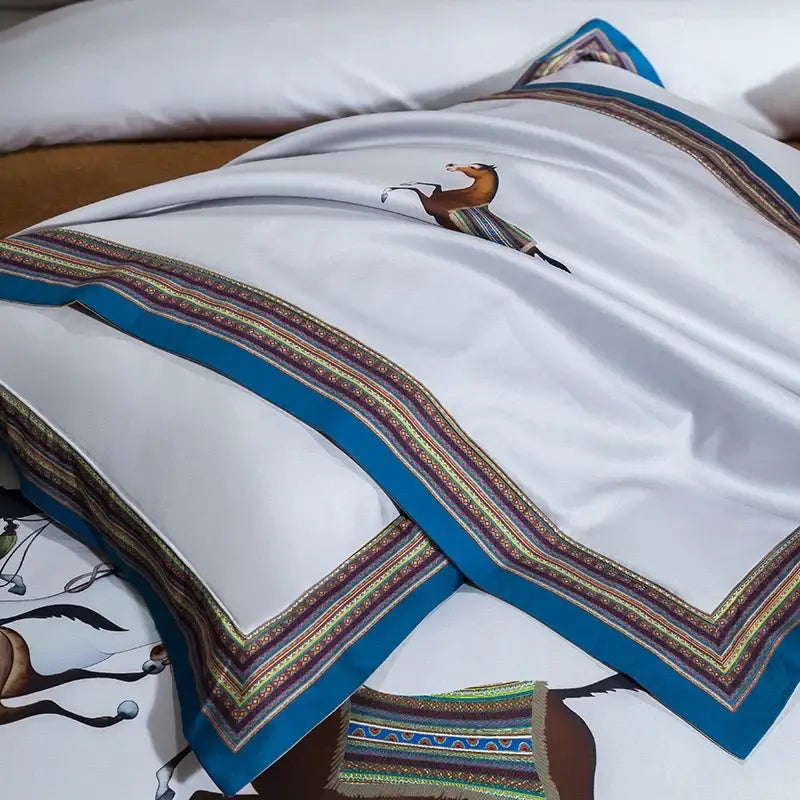 White satin bedding set with brown galloping horse and intricate blue gold green embroidered border decorbites galloping horse luxury
