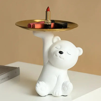 White and gold bear figurine resin storage box with gold tray holding cosmetics for elegant home decor