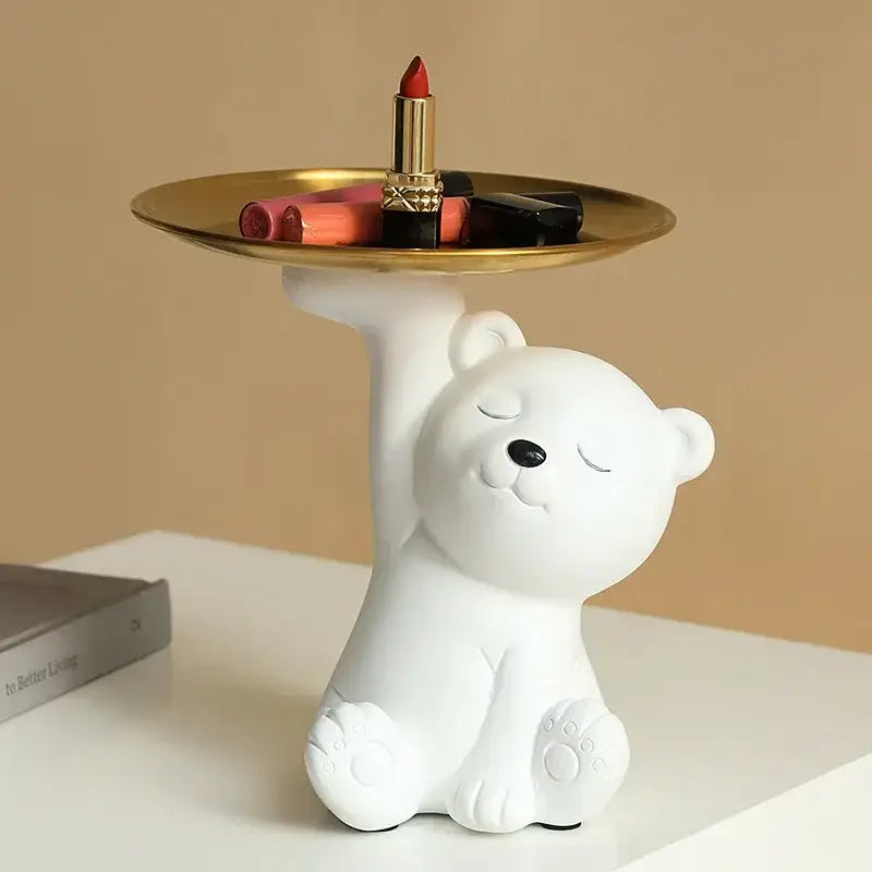 White and gold bear figurine resin storage box with gold tray holding cosmetics for elegant home decor