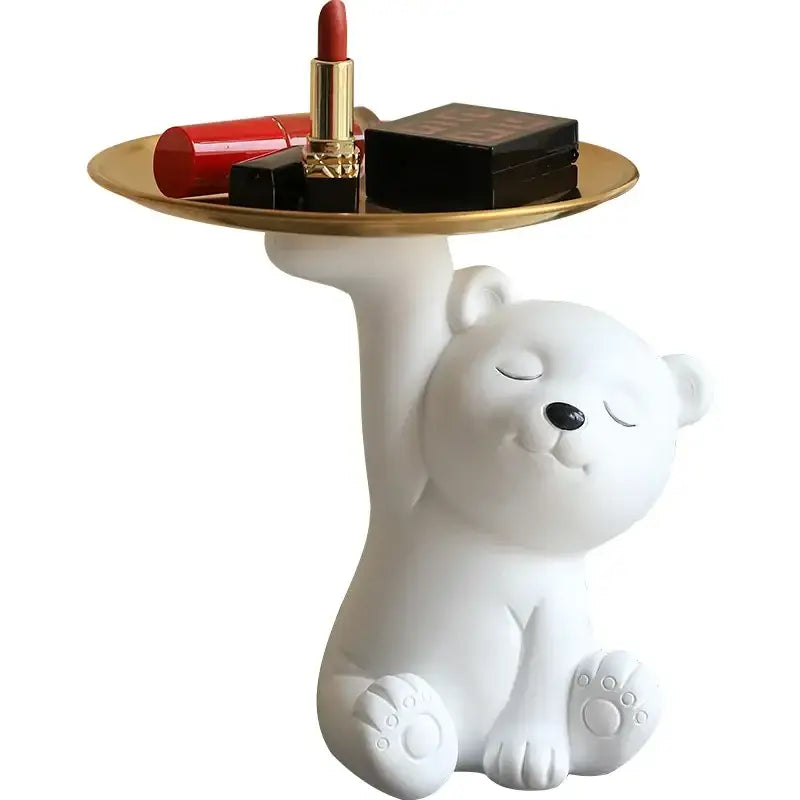 White and gold bear figurine resin storage box with raised paw tray holding red and black cosmetics for home decor