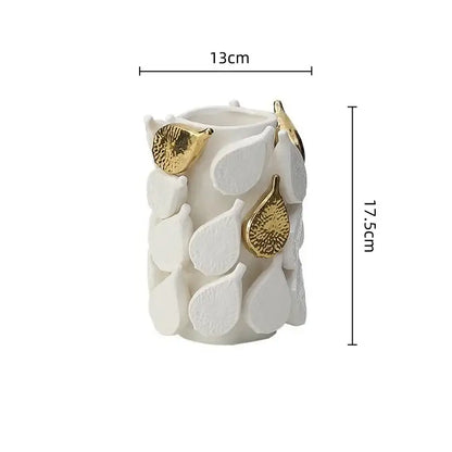 White and gold carambola ceramic vase with textured leaf appliqués and metallic accents for living room decorbites lemon carambola
