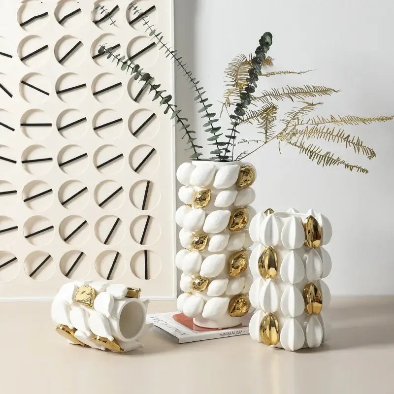White and gold carambola ceramic vase with textured segmented design and gold leaf accents for living room decorbites lemon carambola