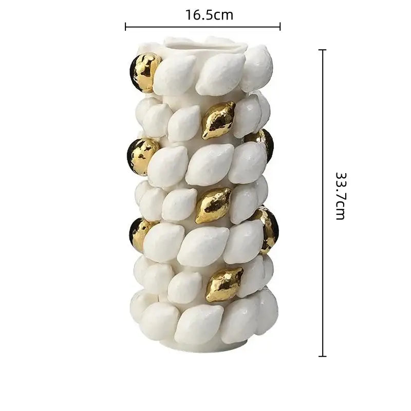 A tall white and gold carambola ceramic vase with textured shell shapes and gold beads for living room decorbites lemon carambola