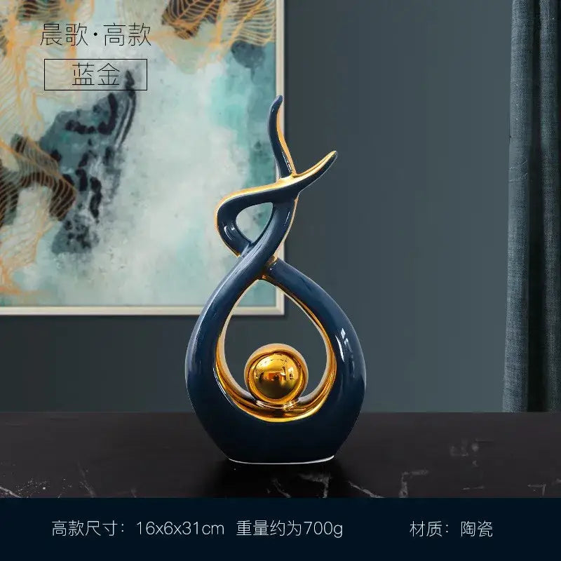 White and gold decorbites ceramic abstract figurine set with navy blue sculpture and gold accents for living room decor