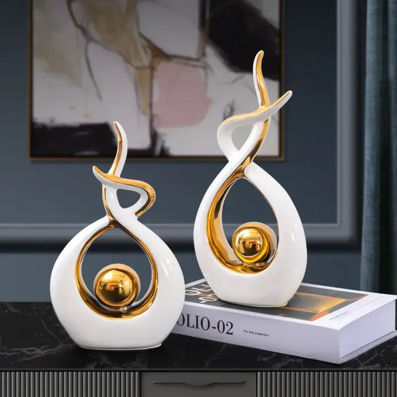 Elegant white and gold ceramic abstract figurine set with reflective spherical details for living room decorbites decor