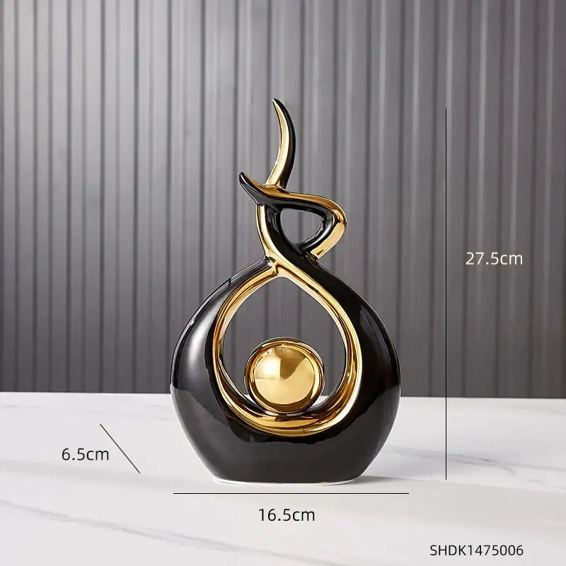 Elegant black and gold ceramic abstract figurine with glossy finish and golden sphere for decorbites ceramic abstract set