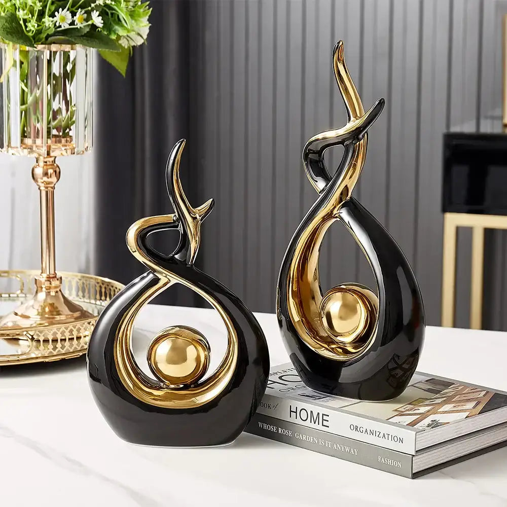 Black and gold ceramic abstract figurine set with flowing intertwined designs for living room decorbites ceramic abstract decor