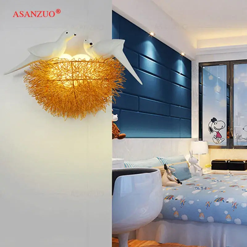 White and gold ceramic nest wall lamp featuring a bird design ideal for children room wall lighting