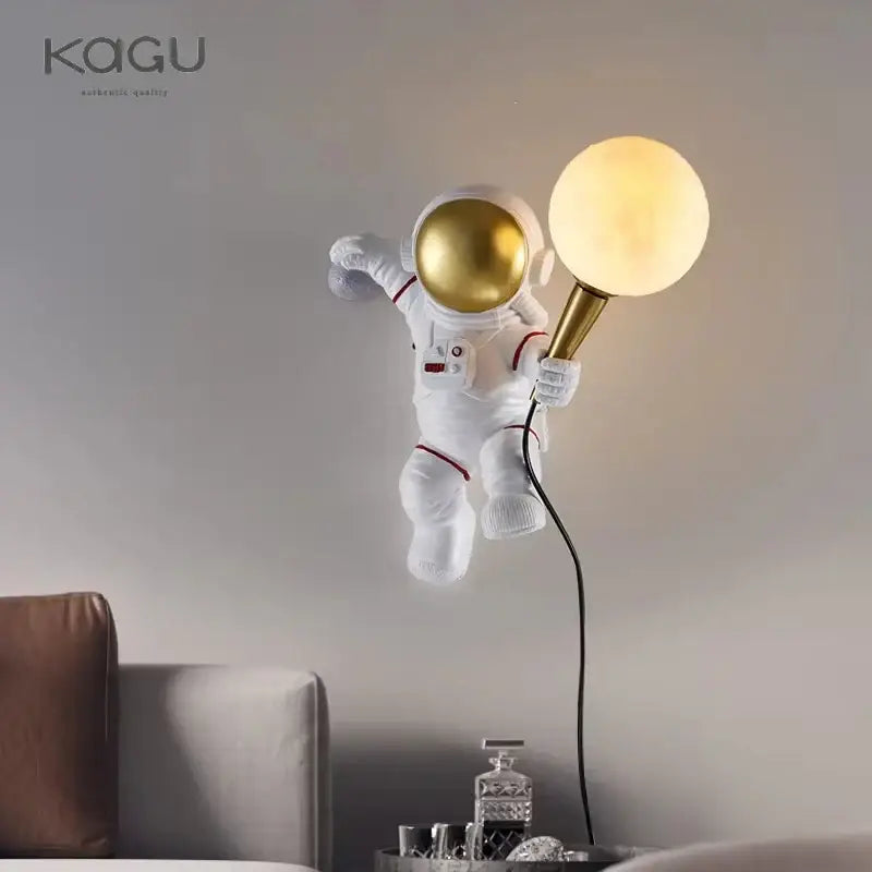 White and gold decorbites astronaut moon wall lamp with gold helmet and spherical bulb for bedroom lighting by kagu