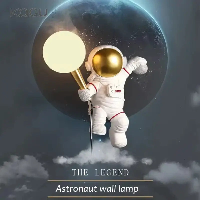 White and gold decorbites astronaut moon wall lamp with gold helmet holding golden light fixture by kagu for bedroom light