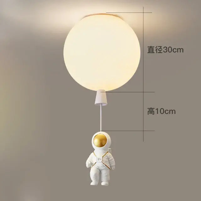 White and gold decorbites astronaut space ball ceiling lamp featuring a figurine holding a 30cm spherical balloon light