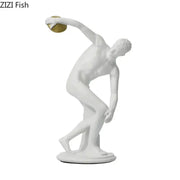 White and gold discus thrower resin sculpture featuring a male statue with a gold-colored disc for living room decor