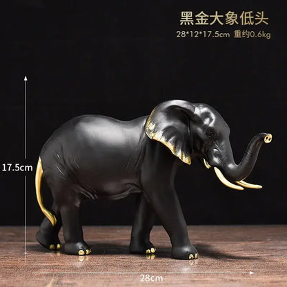 Black and gold decorbites elephant resin sculpture with polished finish and golden accents for living room decor