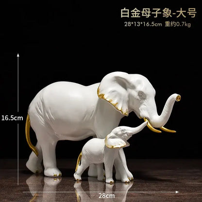 White and gold elephant resin sculpture ornaments featuring porcelain mother and baby elephants for living room decorbites decor