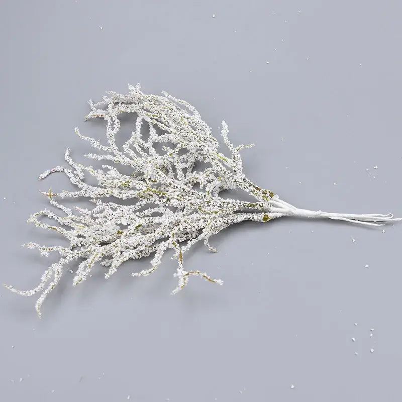 A white and gold glitter delicate frost-covered artificial branch with textured surface for decorbites artificial branches home decor