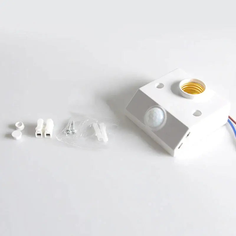 White plastic and gold infrared motion sensor lamp holder with small circular lens for bedroom decorbites motion sensor use