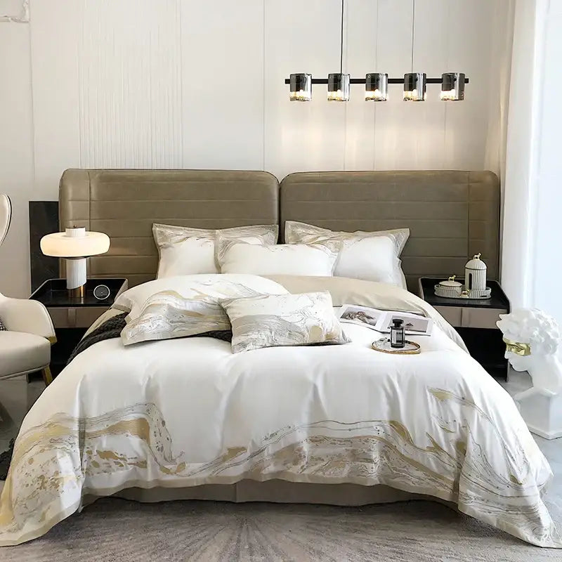 White satin duvet cover with elegant gold abstract wave patterns in egyptian cotton luxury bedding set