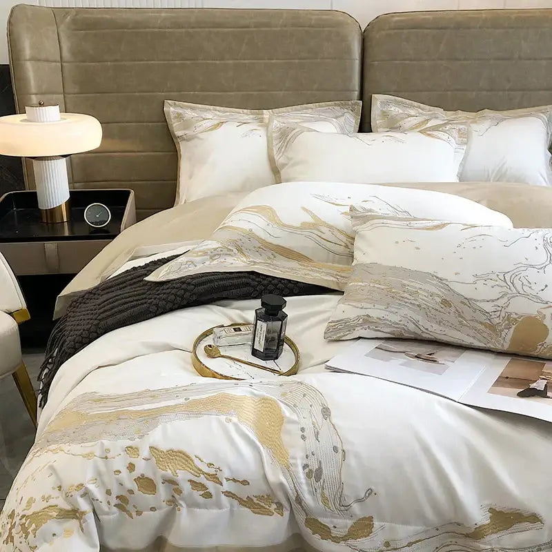 White and gold marble egyptian cotton luxury bedding set with a satin finish for an elegant bedroom look
