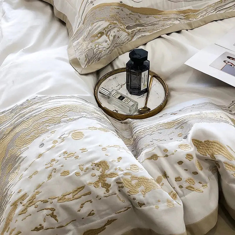 Elegant ivory satin duvet cover with gold embroidery in white and gold marble egyptian cotton luxury bedding set