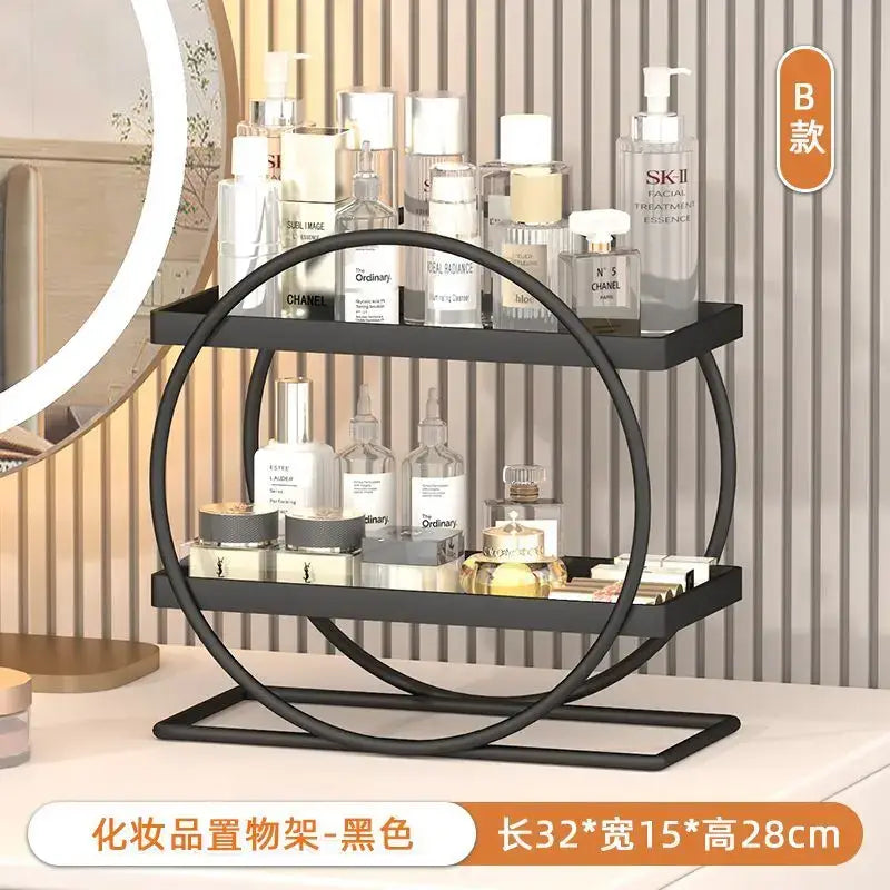 Black metal two-tier makeup organizer with circular frame design complementing decorbites golden makeup collection