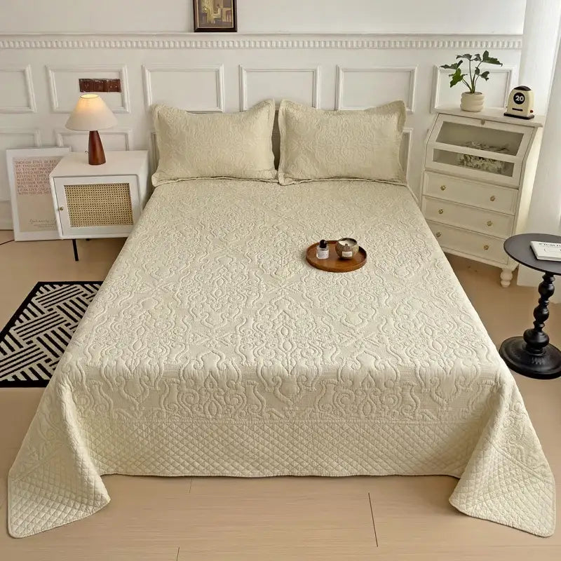 Cream-colored decorbites cotton quilted embroidered bedspread set with floral pattern and diamond-stitched texture