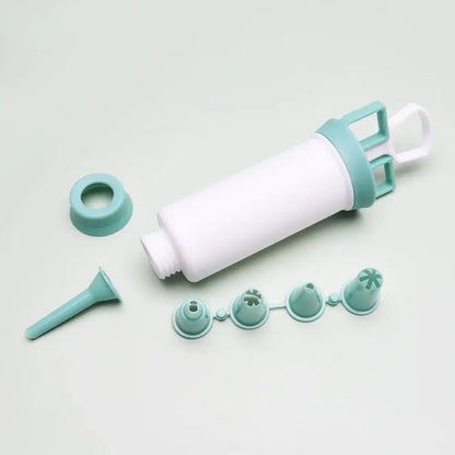 White and gray silicone cream decorating gun with handle and interchangeable tips for decorbites cake cream use
