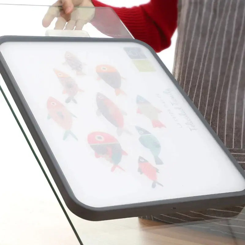White and gray fish design cutting board with colorful fish lightbox decorbites dual-use chopping block