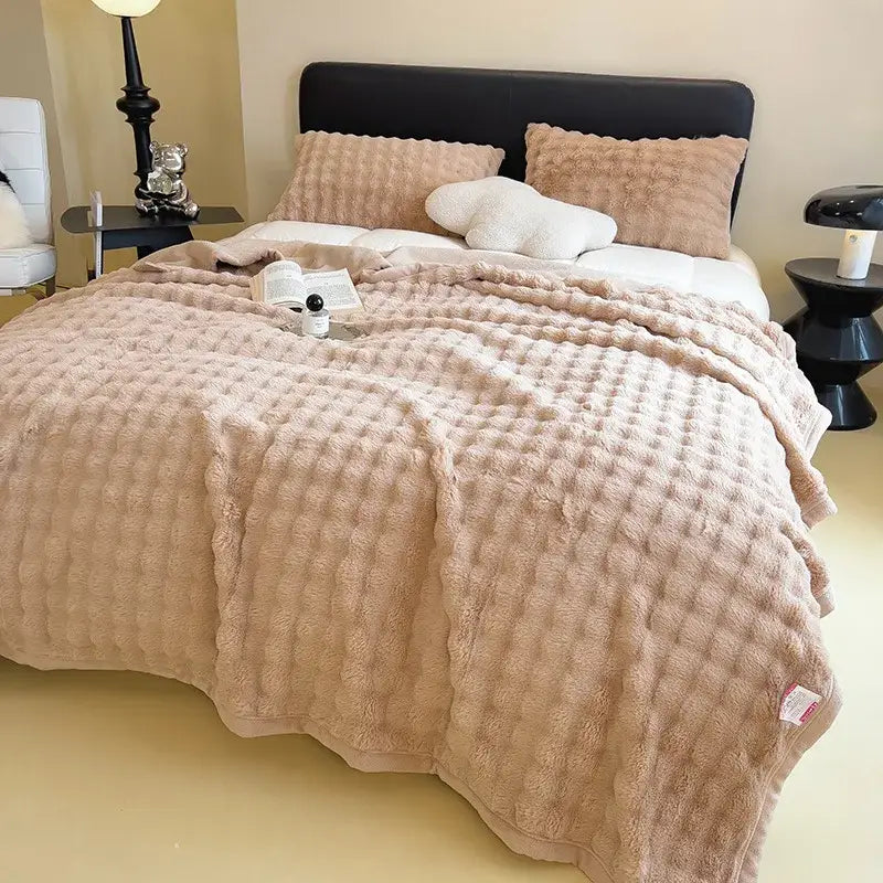 Beige textured plush throw blanket with soft fluffy surface and raised diamond pattern for decorbites cartoon printed faux rabbit use