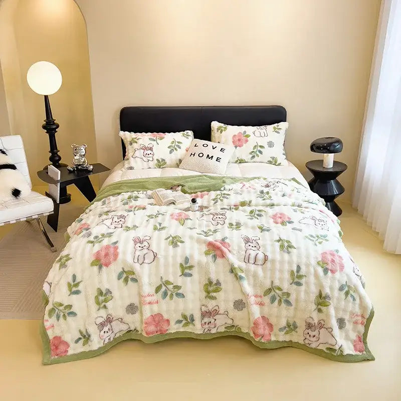White and green cartoon printed faux rabbit plush blanket with pink roses on cream quilted fabric for bedroom decorbites