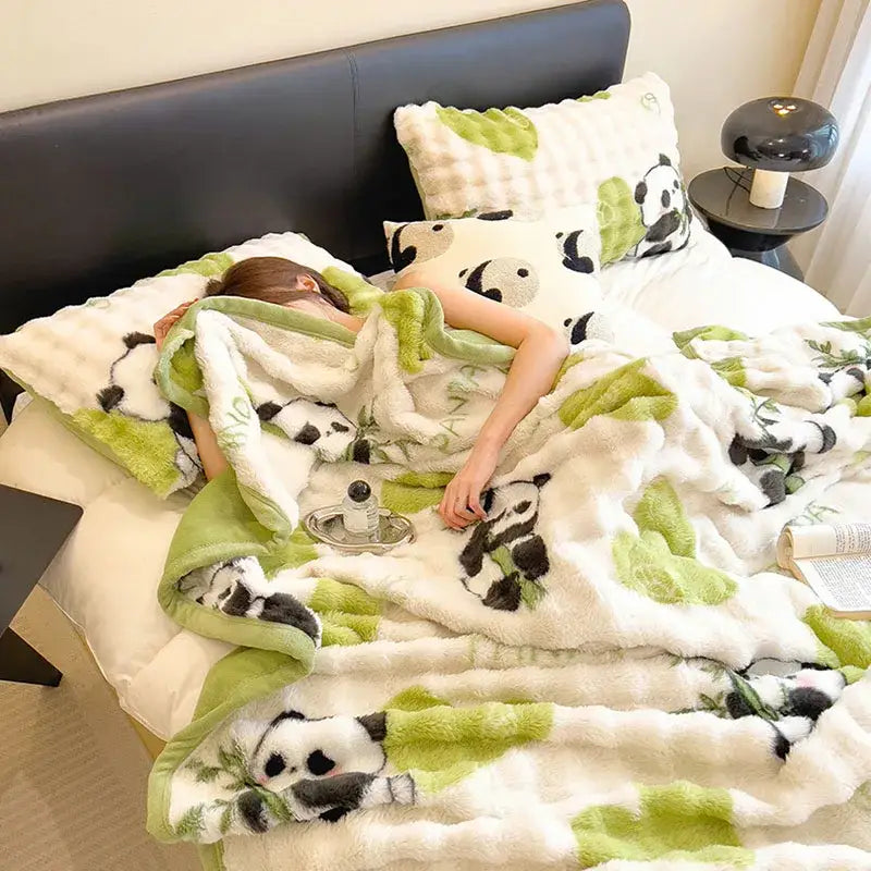Soft white and green plush blanket with black panda prints featuring decorbites cartoon printed faux rabbit design for bedroom decor