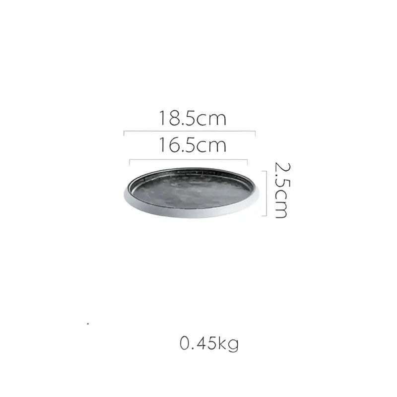 Dark gray round ceramic tray with matte finish and slightly raised rim from decorbites ice cracked glaze dinnerware set