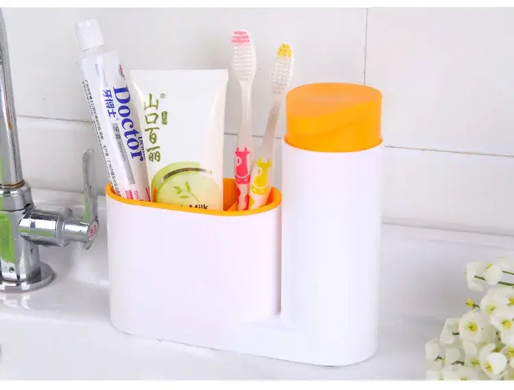 White and orange plastic toothbrush holder with separate toiletries compartment next to a lime green soap dispenser for bathroom shampoo soap organization
