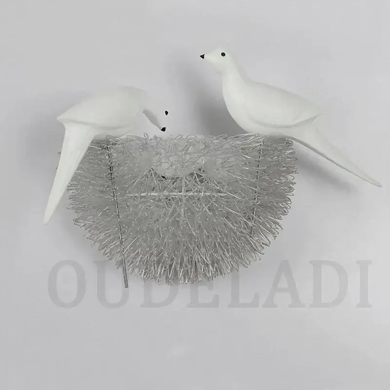 White ceramic dove wall lamp with a silver metallic wire nest led wall lamp for bedroom decorative light