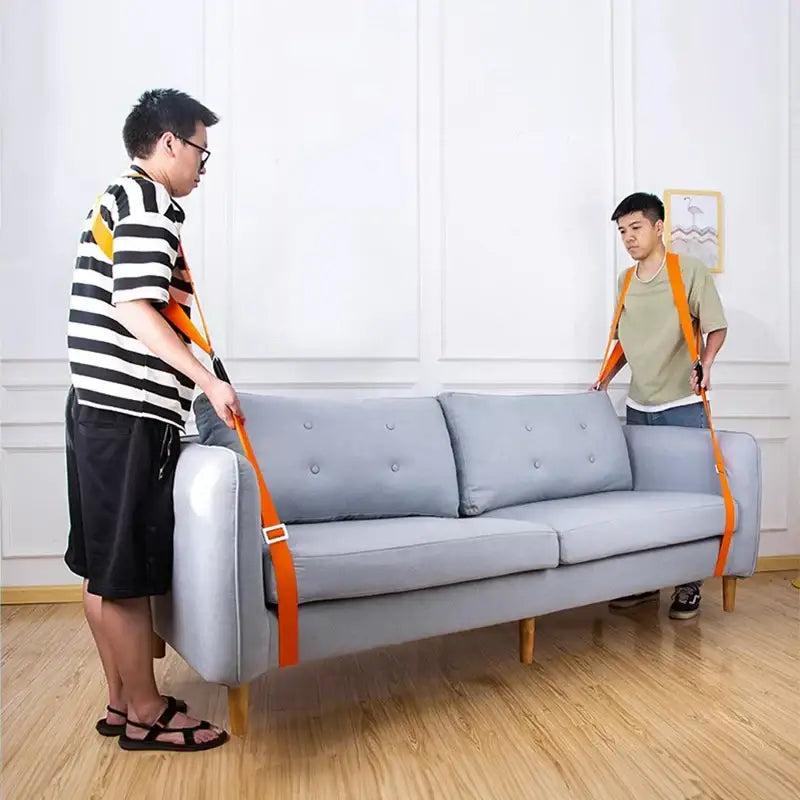Gray upholstered sofa with wooden legs secured by white and orange decorbites furniture lifting straps for moving