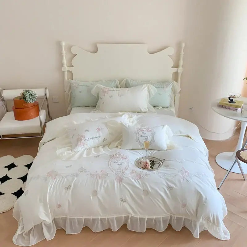 White and pink 4pcs flowers embroidery bedding set with delicate floral lace trim and ruffled edges for bedroom use
