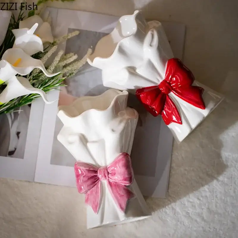 White and pink bowknot ceramic vase with glossy red accent from decorbites bowknot ceramic living room decor
