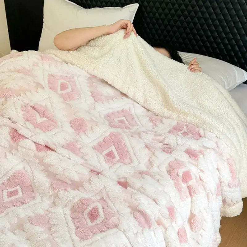 A plush white and pink geometric jacquard taff velvet blanket ideal for cozy bedroom decorbites style throw