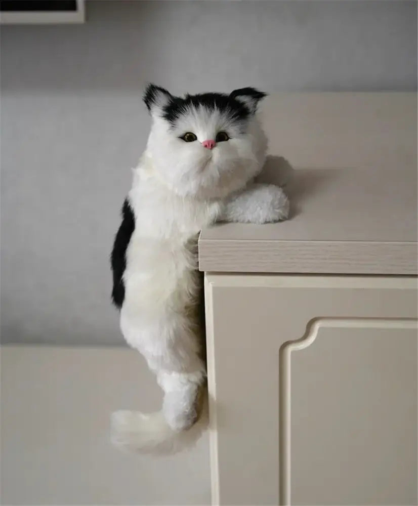 A plush black and white hanging cat plush doll with soft fur and detailed features for decorbites living room decor