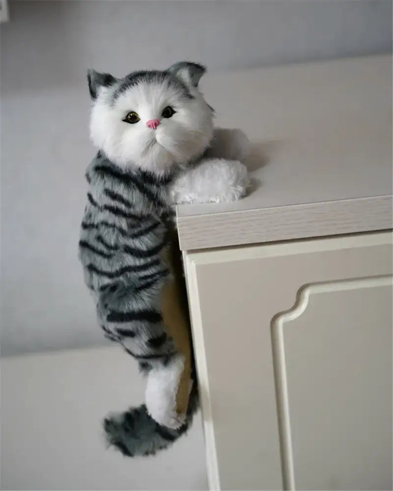 A plush gray and white tabby hanging cat plush doll with black stripes and pink nose for decorbites hanging cat decor