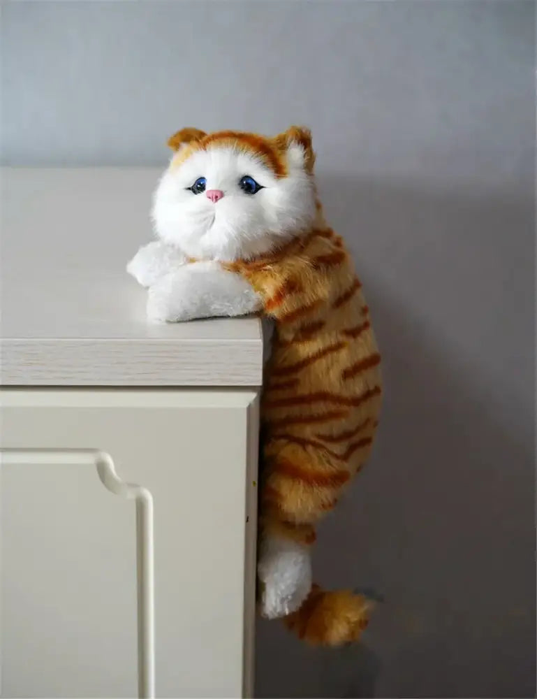 White and tan hanging cat plush doll with soft orange and white fur blue eyes and pink nose perfect for living room decorbites decor