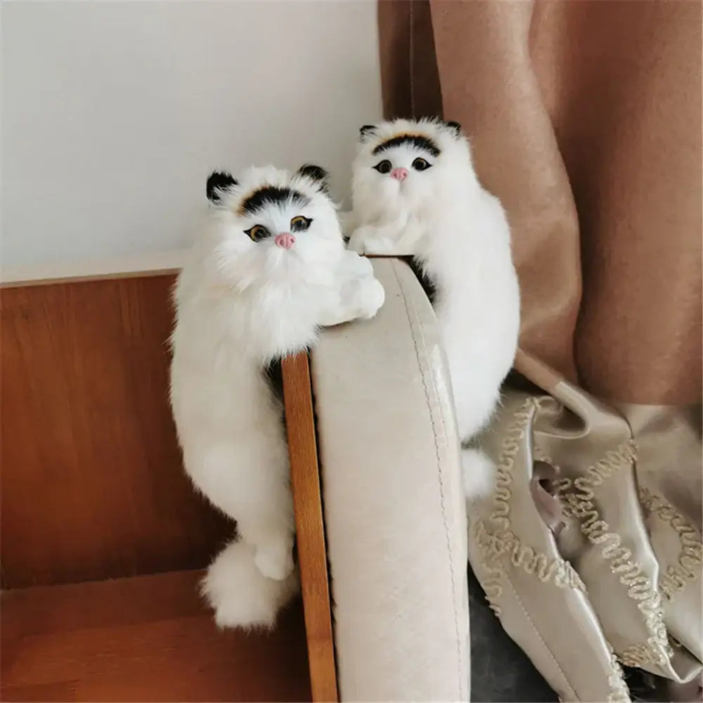 Two white and tan hanging cat plush dolls with black facial markings and embroidered eyes for living room decorbites decor