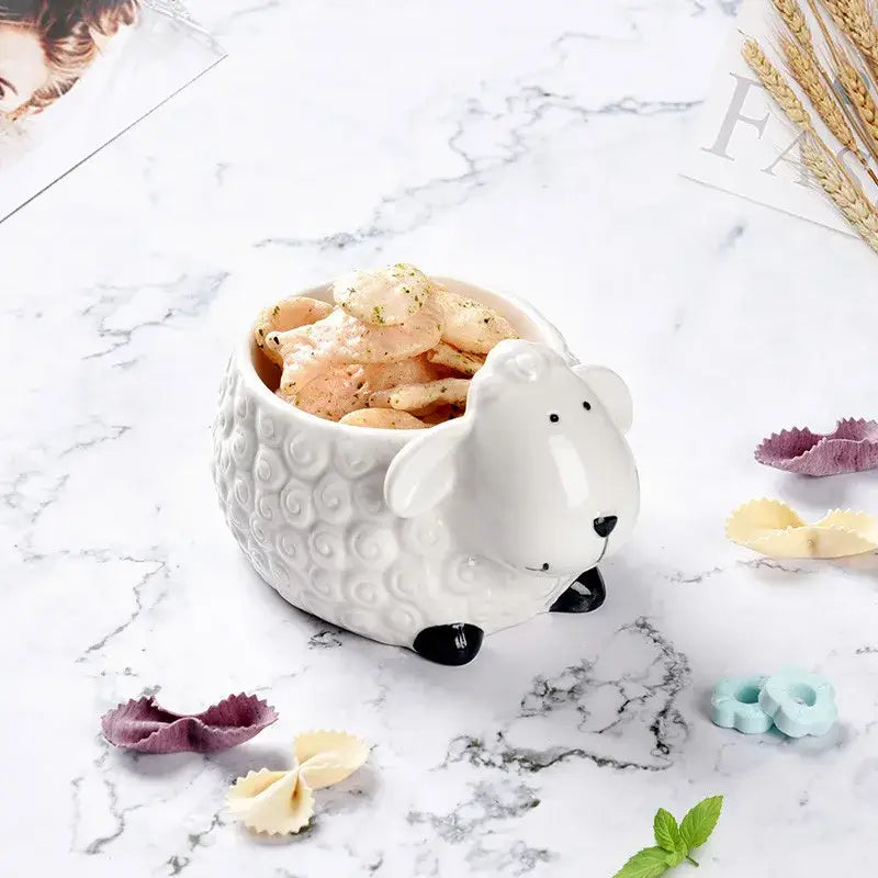 White ceramic sheep shaped bowl with black nose and feet accents as a decorbites duck ceramic dessert bowl alternative