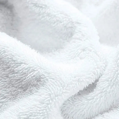 White plush fleece blanket with soft textured surface for baby elder hypoallergenic waterproof fitted sheet cover