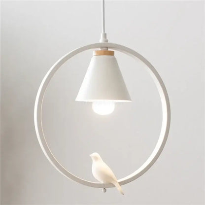 White ceramic iron ring pendant light with a circular frame and small bird figurine for bedroom decorbites decor