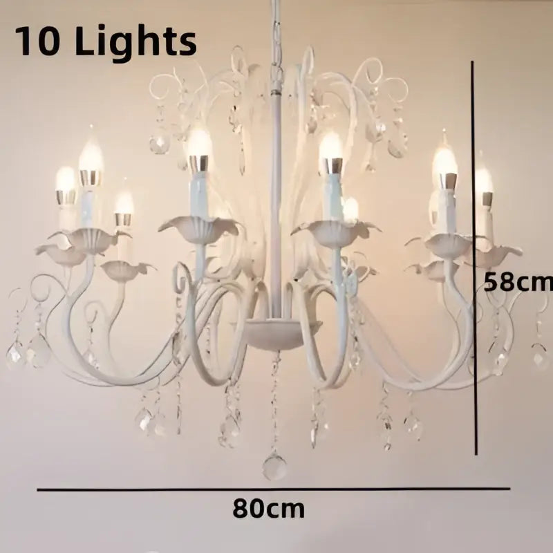 White and black metal chandelier with ten lit bulbs and crystal pendants for dining room decorbites black white style