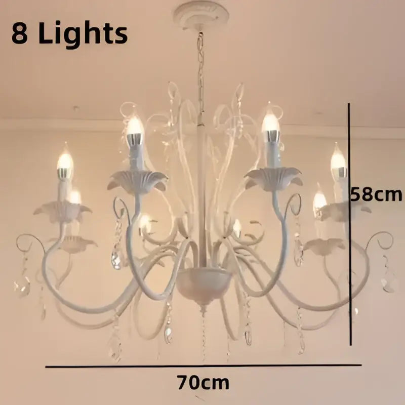 White and black metal chandelier with crystal pendants featuring eight candle-style lights for dining room decorbites black white